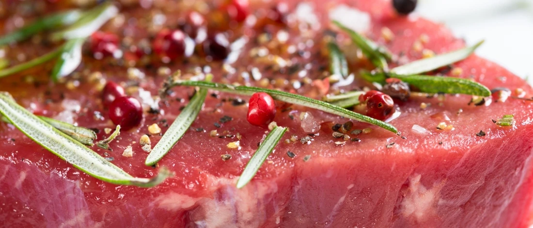 A seasoned raw meat