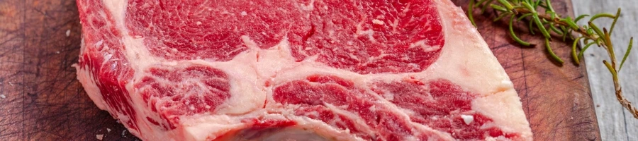 A slice of fresh raw meat for steak
