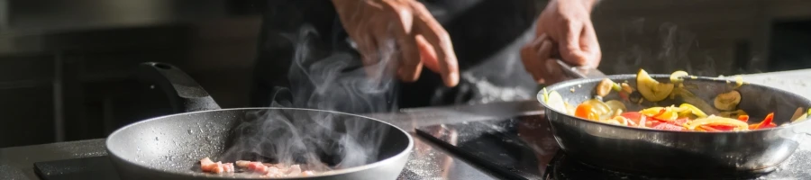 A man cooking in the kitchen