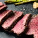 Slices of medium rare steak on a table